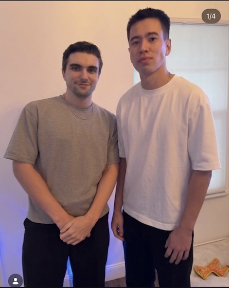 Two men standing together